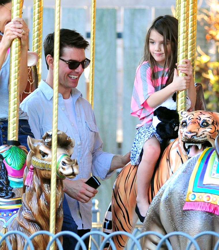 Tom Cruise, Katie Holmes &amp; Suri Visit The Schenley Plaza Carousel